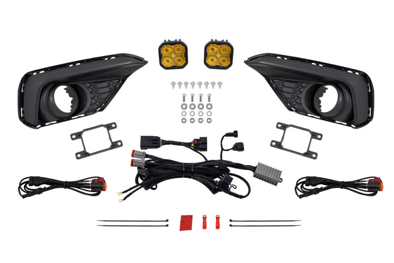 Diode Dynamics yellow fog lamp kit for 2026 Ford Mustang EcoBoost, featuring compact light bars and cubes for enhanced visibility.