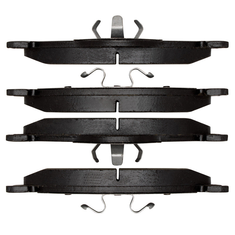 R1 Concepts Dodge Durango front ceramic brake pads showing OE brake pads with metallic backing and friction material