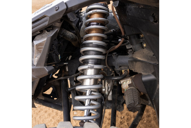 Eibach Can-Am Maverick X3 MAX Pro-UTV Stage 3 suspension springs installed in the vehicle, highlighting high-performance shock components.
