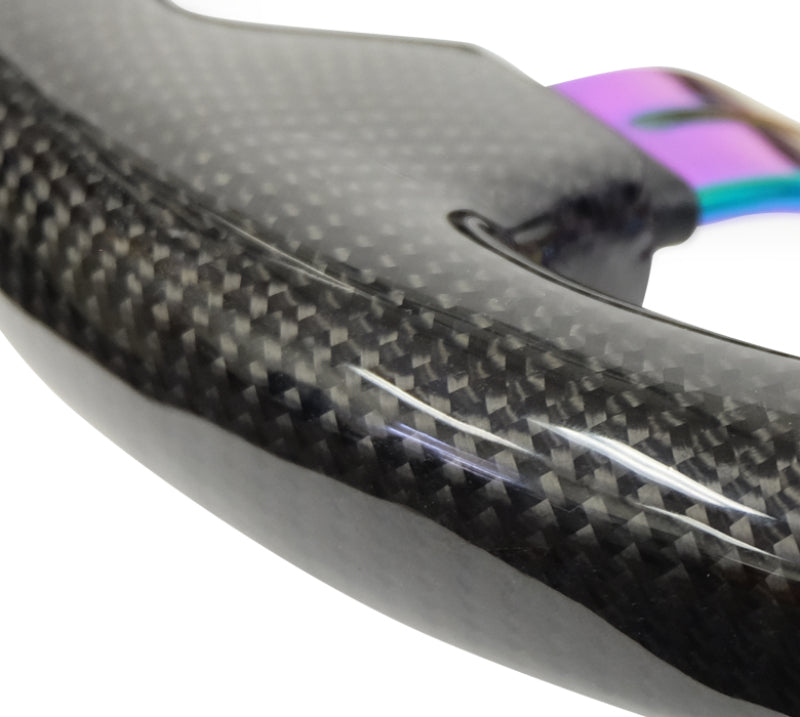 NRG carbon fiber steering wheel with 3-spoke neochrome finish, 350mm diameter, deep dish design, featuring slit cut accents.