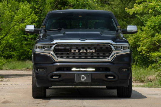Diode Dynamics SS18 Stealth Bracket Kit for 2019-present Ram, black light mount brackets installed on vehicle.