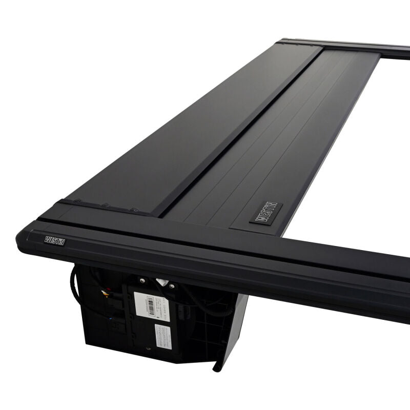 Westin retractable tonneau cover in black for 2019-2026 Ram 1500 with 6.4ft bed, new body style, shown installed on truck bed.