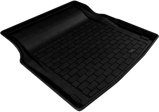 Black rubber cargo liner for 2010-2016 Mercedes-Benz E-Class by 3D MAXpider, designed to protect the trunk area.