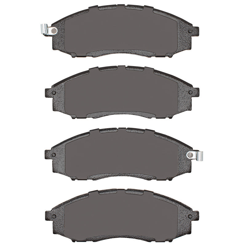 R1 Concepts Nissan XTerra front ceramic brake pads, OE type, showing the black brake pad with metal backing for effective stopping.