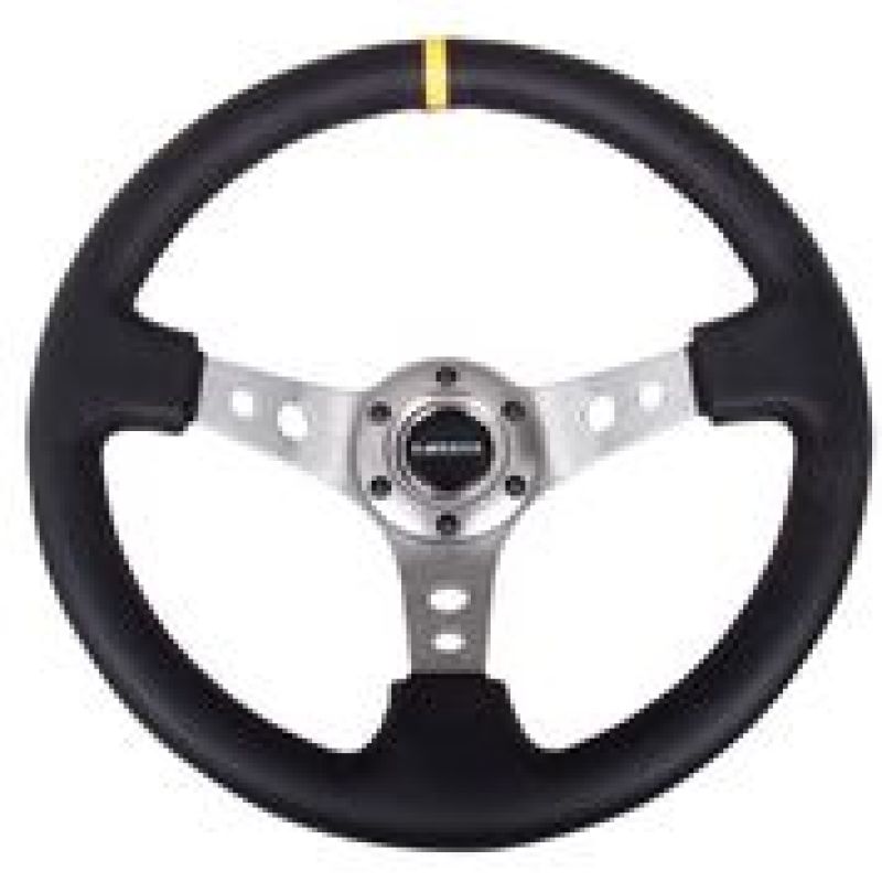 NRG reinforced 350mm black leather steering wheel with gunmetal cutout spoke and yellow accents, suitable for racing or custom cars.