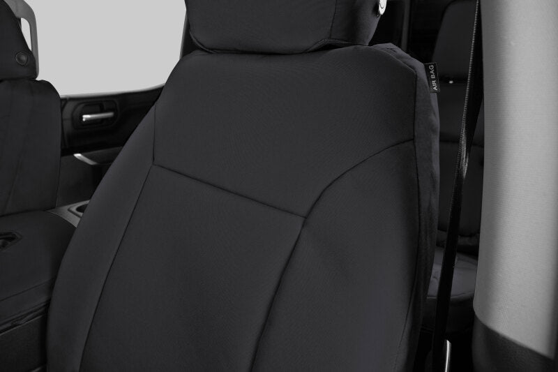 Covercraft Endura PrecisionFit custom front seat covers for Ford Transit 15-24, black fabric with snug fit on vehicle seats