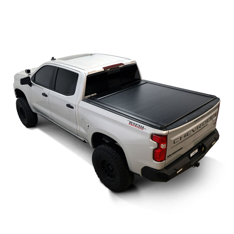 Westin roll-up tonneau cover in black on Silverado/Sierra 1500 5ft 8in bed, manual retractable design for truck bed protection
