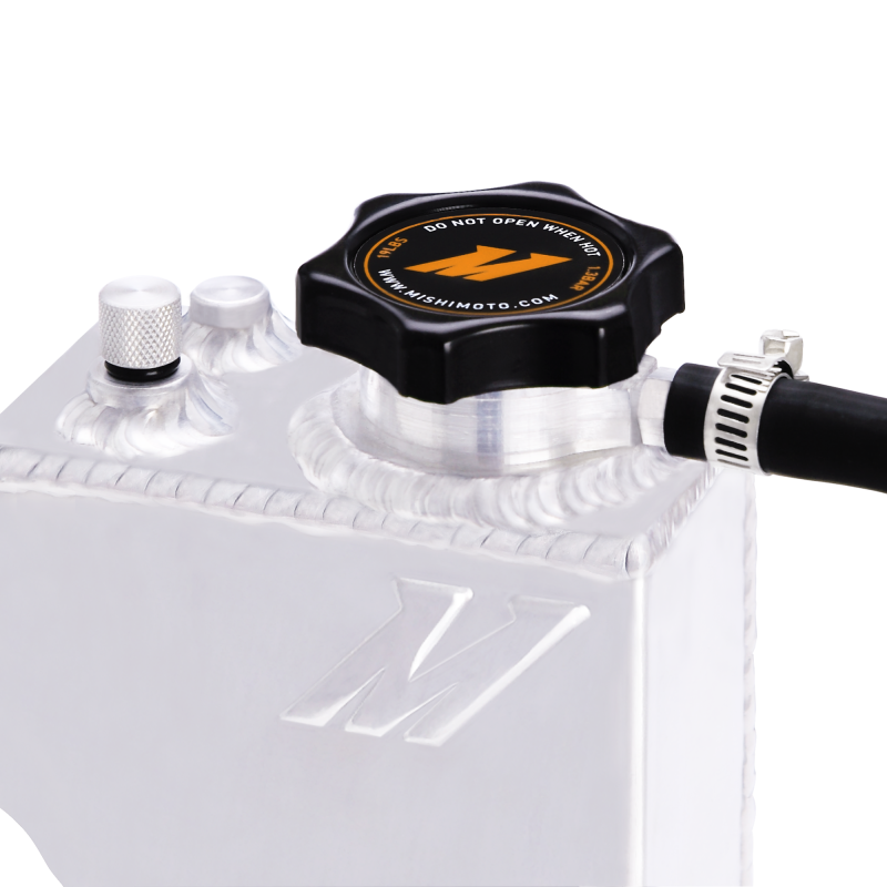 Mishimoto aluminum coolant expansion tank for BMW 3 Series 92-99, close-up view of the shiny aluminum reservoir with mounting points.