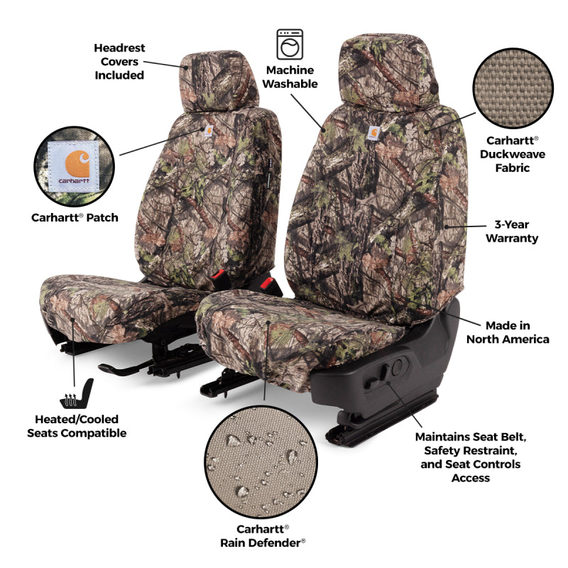 Covercraft Carhartt Camo SeatSaver front seat covers installed in a Dodge Nitro, made of durable fabric with camouflage pattern.