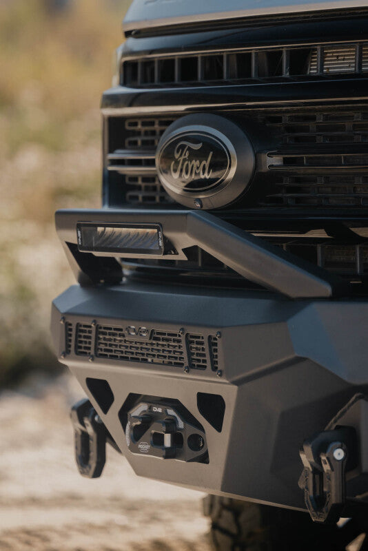 Steel front bumper for Ford Super Duty F-250/F-350 from DV8 Offroad Spec Series, rugged off-road bumper with reinforced steel construction.