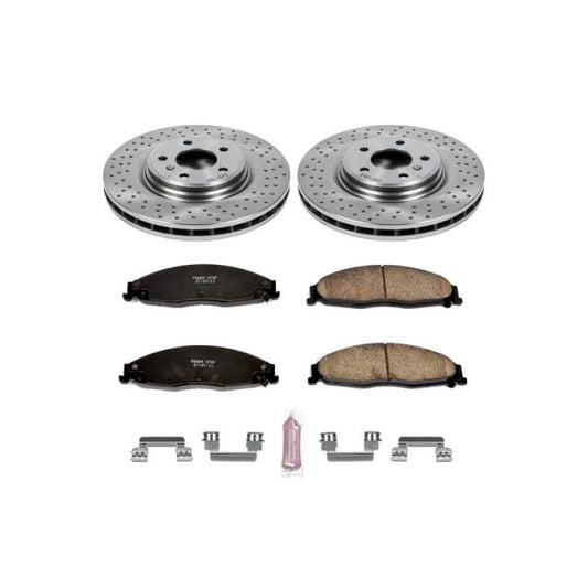 PowerStop OE front brake kit for 2005-2008 Pontiac Grand Prix, including brake rotors and pads, installed on vehicle.