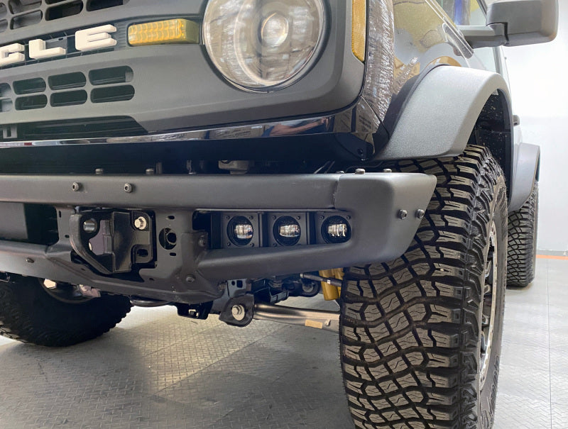 Oracle Lighting triple LED fog lights kit for 2021-2022 Ford Bronco with steel bumper, featuring white LED bulbs and robust design.