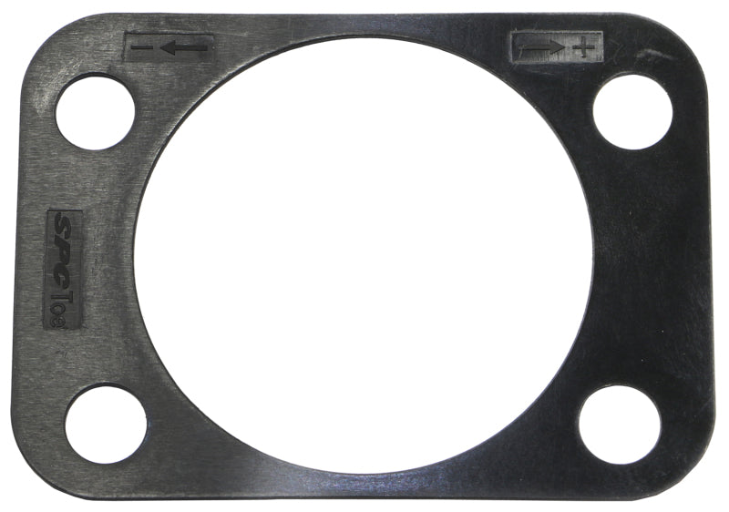 Moog 15-20 Honda Fit rear suspension alignment shim installed for precise wheel alignment and suspension adjustment.