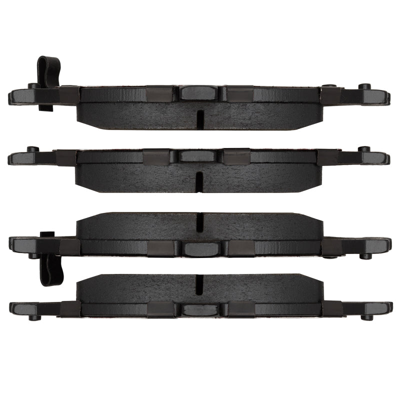 Chevrolet Classic front R1 Optimum OE brake pads by R1 Concepts installed on vehicle brake rotor.