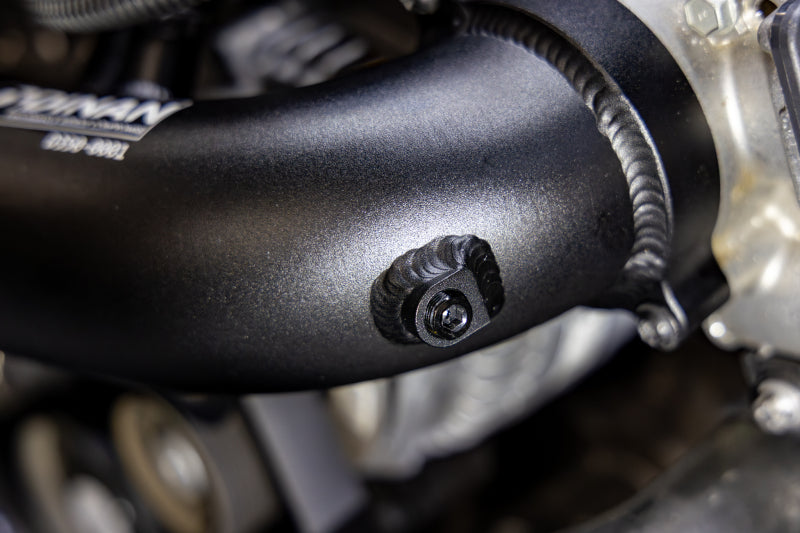 Dinan BMW G20 G22 G23 G42 B58D intercooler pipe kit installed on engine with metal and silicone components visible