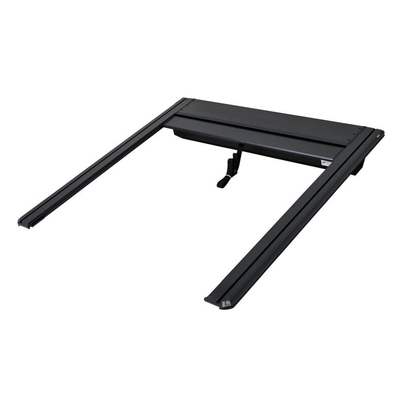 Westin 24-26 Toyota Tacoma black roll-up retractable tonneau cover mounted on 5ft truck bed, showing the sleek, secure design.