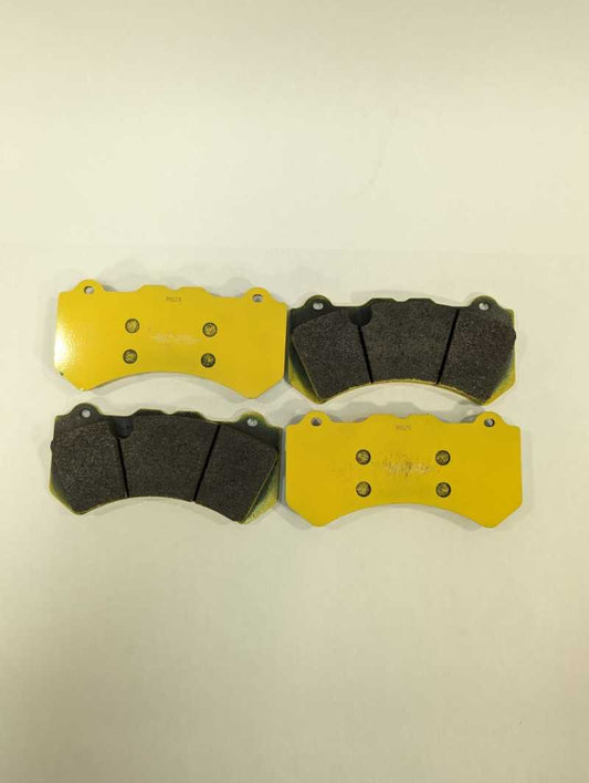 Alcon performance front brake pad set for Nissan GT-R R35, model CAR70 RS29, showing metallic brake pads with branding.