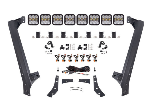 Diode Dynamics Jeep JK SS5 Sport CrossLink windshield light bar kit with white LED light bar and mounting brackets.