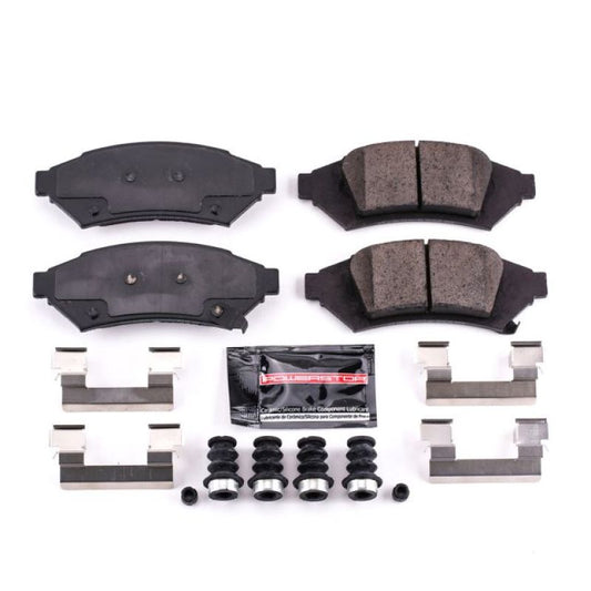 PowerStop Z23 Evolution Sport brake pads with hardware installed on a 2004 Pontiac Grand Prix, showcasing performance brake components.