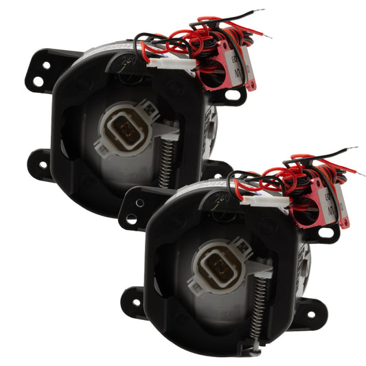 Oracle Lighting blue LED halo fog lights installed on a 2010-2015 Jeep Wrangler JK, showcasing pre-assembled fog light assembly.