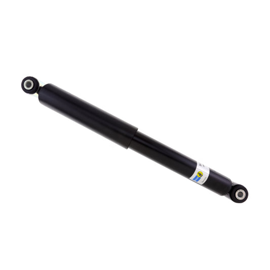 Bilstein B4 Ford Transit Connect XLT twin-tube shock absorber installed on vehicle, showcasing durable suspension component.