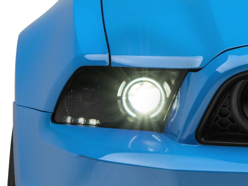 Raxiom Ford Mustang Axial Series HID bulb upgrade with 6000K color temperature, showing the bright HID bulb installed in a Mustang.