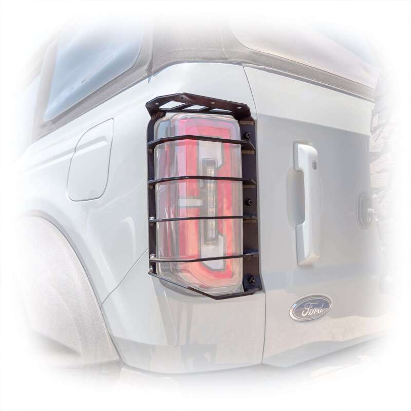 TURN Offroad 2021+ Ford Bronco rear tail light guards installed on tail lights, durable off-road protection for vehicle rear.
