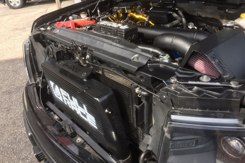 CSF transmission oil cooler for Ford F-150 and Raptor models, showing the compact cooling unit with cooling fins and fittings.