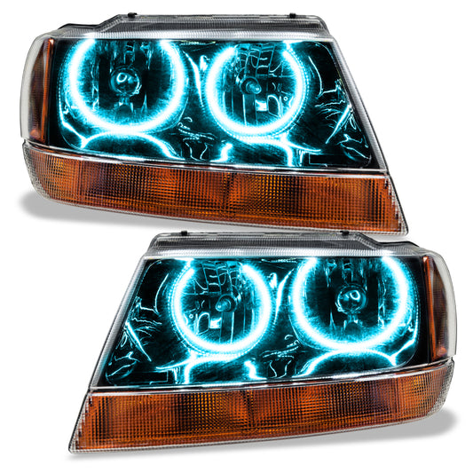 Oracle Lighting Jeep Grand Cherokee 99-04 SMD Headlights in black with ColorSHIFT and BC1 controller, showcasing modern automotive lighting.