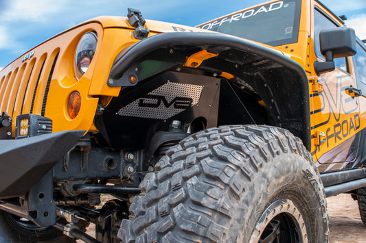 Black aluminum inner fender liner for Jeep Wrangler JK from DV8 Offroad, designed for front wheel well protection.