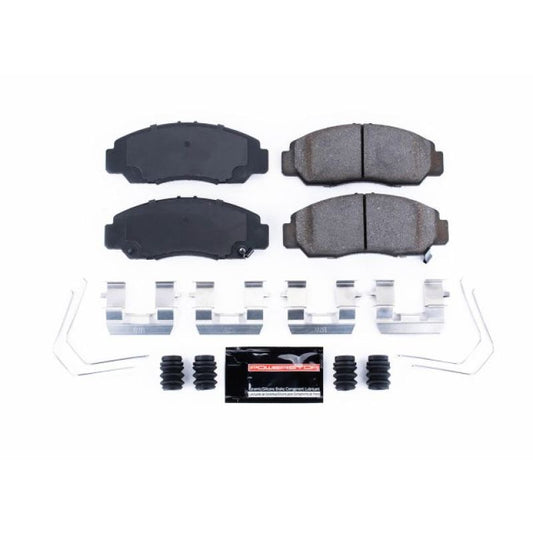 PowerStop Z23 Evolution sport front brake pads with hardware installed on a Honda Civic, designed for performance braking.