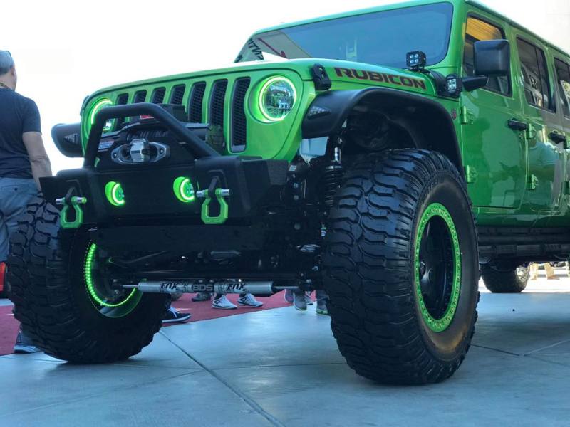 Oracle Lighting Jeep Wrangler JL and Gladiator JT LED surface mount fog light halo kit with color-changing RGB halos installed.