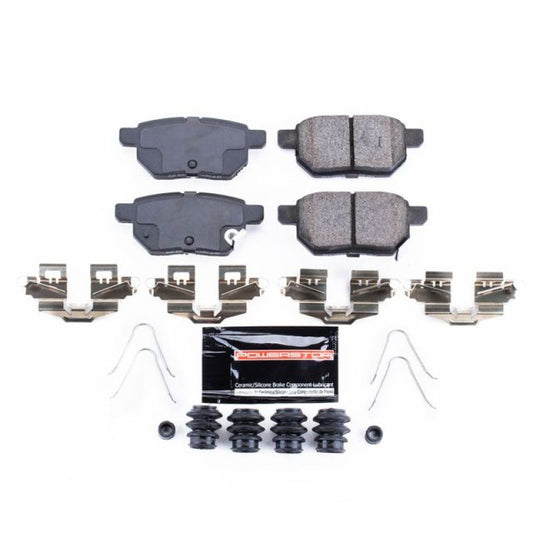 PowerStop Z23 Evolution sport rear brake pads with hardware for Lexus CT200h 2011-2017, showing new brake pads and hardware components.