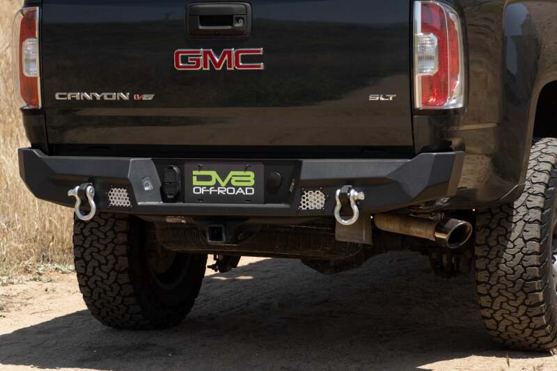 Steel rear bumper for Chevy Colorado and GMC Canyon by DV8 Offroad, part of the MTO Series, designed for off-road durability.