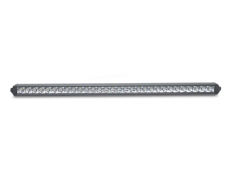 Raxiom 20-inch LED light bar with front bumper mounting bracket installed on a 2005-2015 Toyota Tacoma for off-road lighting.