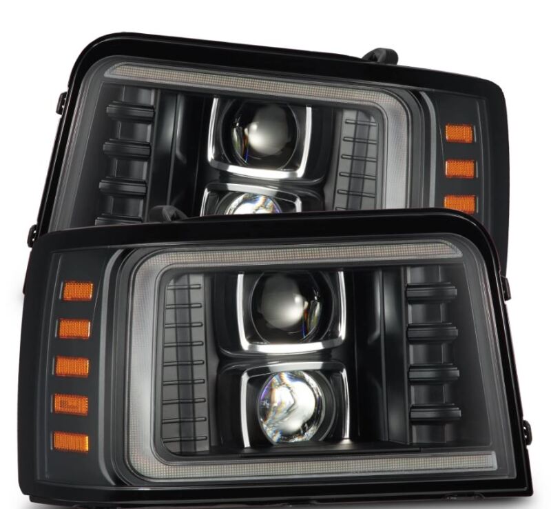 AlphaRex 92-96 Ford F-Series/Bronco PRO-Series projector headlights with black housing, sequential turn signals, and daytime running lights.
