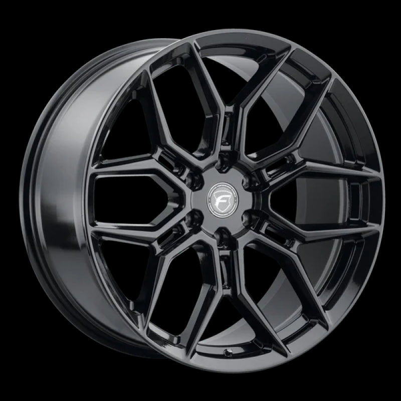 Forgestar X12 22x10 cast wheel in gloss black with 6x135 bolt pattern, ET30 offset, and 6.68-inch backspacing.