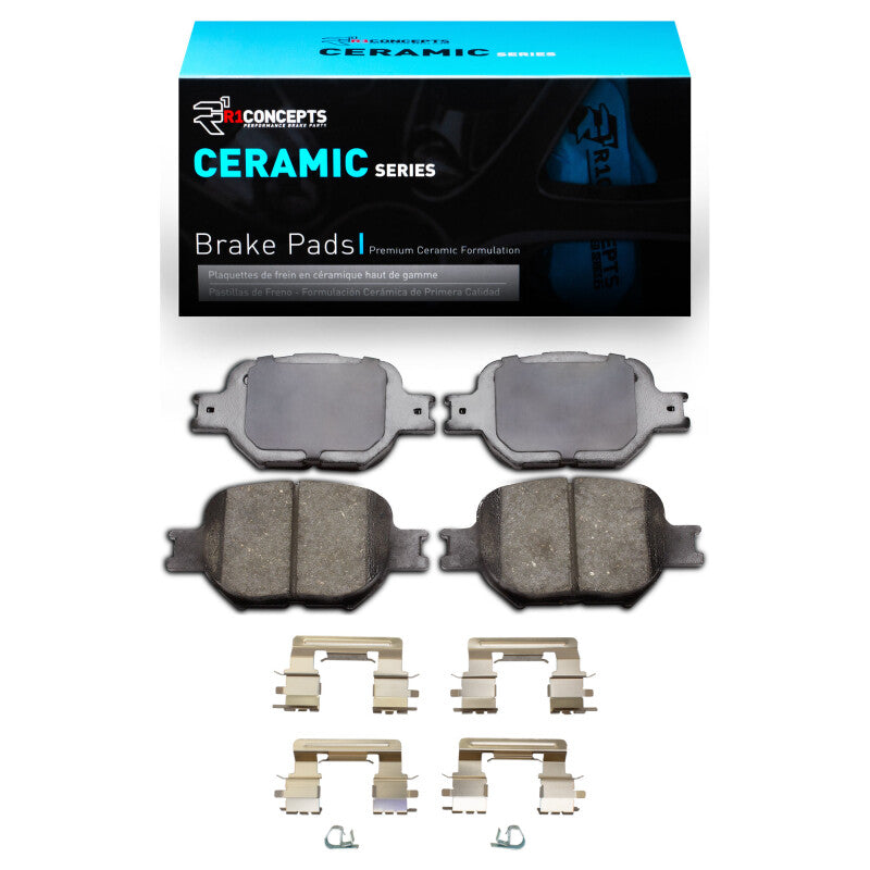 R1 Concepts OE ceramic brake pads and hardware kit for Scion TC 2000-2010 front installation, showing brake pad set and hardware components.