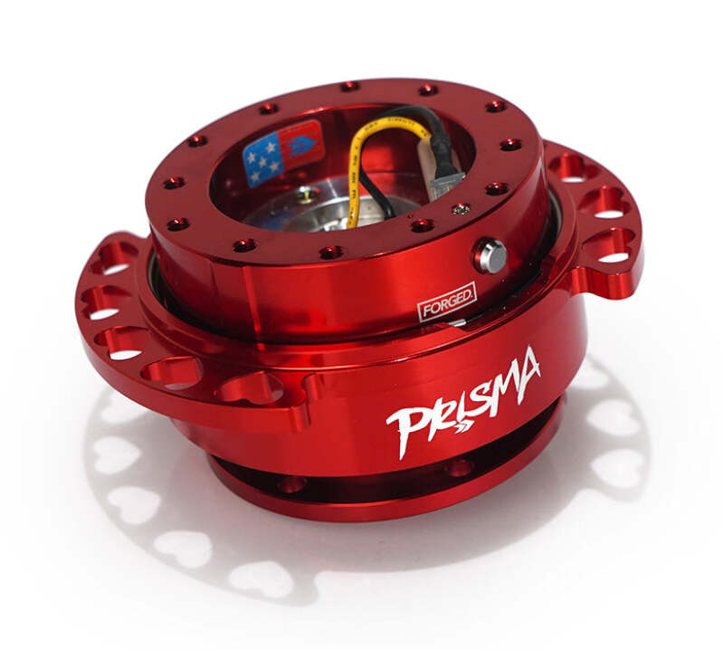 NRG Quick Release Kit with red body and heart-shaped cutout ring, designed for easy attachment and removal of steering wheels.