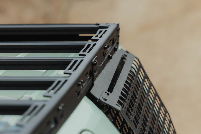 DV8 Offroad Toyota 4Runner exterior window Molle panel for DV8 roof rack, driver side, mounted on vehicle window area.