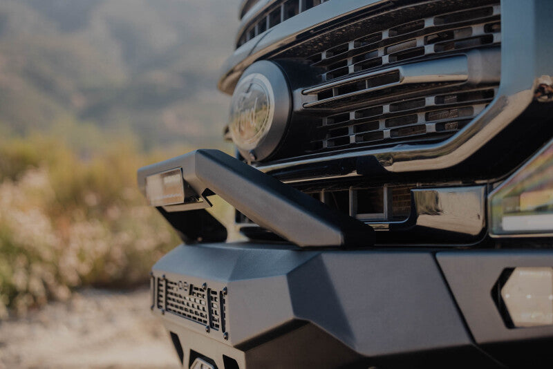 Steel front bumper for Ford Super Duty F-250/F-350 from DV8 Offroad Spec Series, rugged and heavy-duty design.