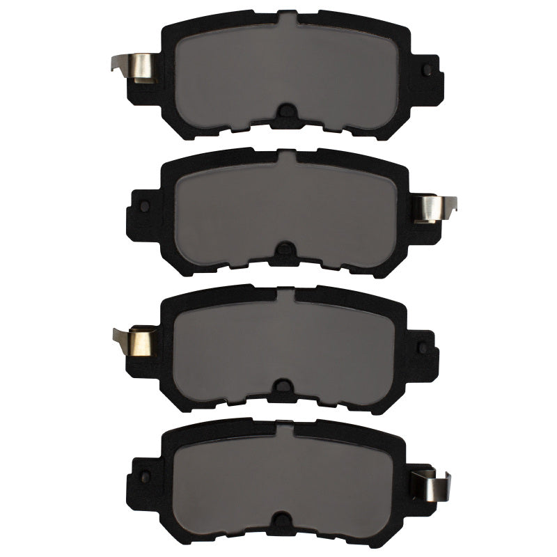 R1 Concepts Mazda CX-3 2013-2018 rear ceramic brake pads, OE quality, shown in black with metal backing plates.