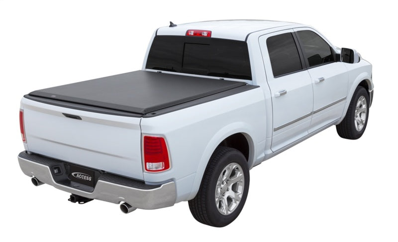 Access Limited roll-up truck bed cover for Dodge Dakota Crew Cab 08-11 with utility rail, providing durable exterior bed protection.