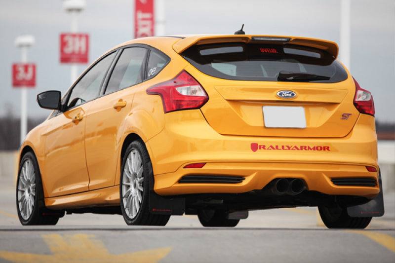 Rally Armor black mud flaps with Nitrous Blue logo installed on a 2012-2019 Ford Focus ST or 2016-2019 RS.