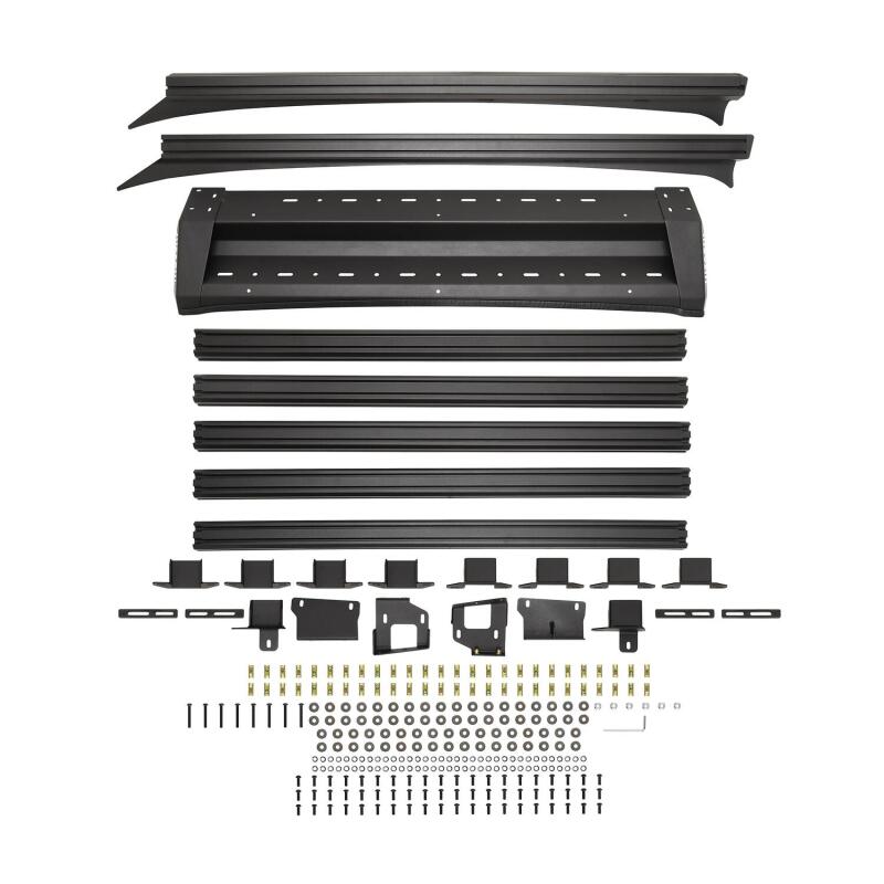 Westin 16-23 Toyota Tacoma Mesa Roof Rack installed on truck bed with mounted accessories and crossbars for cargo transport.