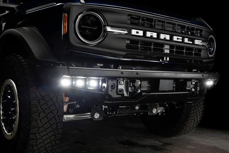 ORACLE Lighting Ford Bronco 21-22 triple LED fog lights kit mounted on steel bumper with white LEDs.