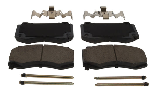 Baer Brakes performance Claw brake pads installed on a 2005-2010 Chrysler 300, showing the durable brake pad design.
