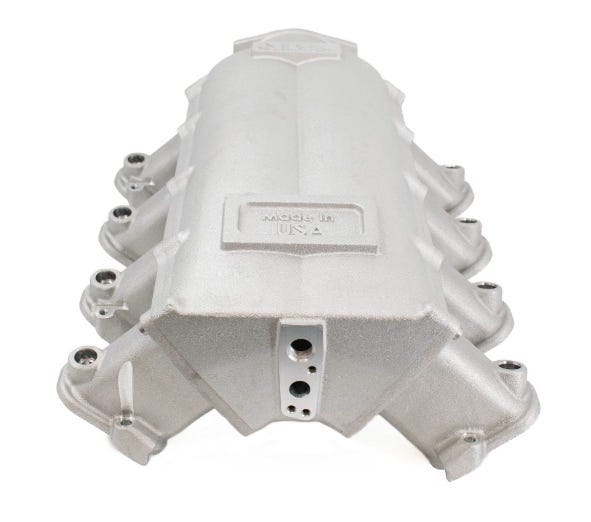 BTR Trinity intake manifold for cathedral port engines, natural finish, close-up view of the BTR Brian Tooley Racing intake accessory