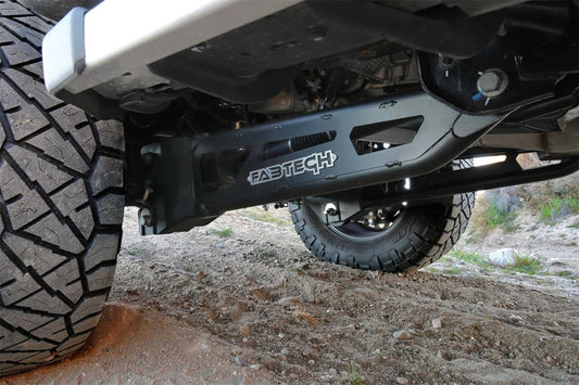 Fabtech 23-24 Ford Super Duty diesel lift kit with 4-inch radius arm component box, showcasing heavy-duty off-road suspension parts.