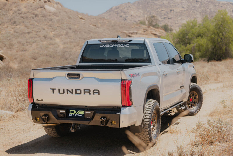 Steel rear bumper for Toyota Tundra from DV8 Offroad's Spec Series, designed for enhanced durability and off-road protection.